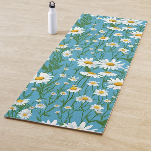 Witte zomerdaisies op aqua yogamat (In situ)