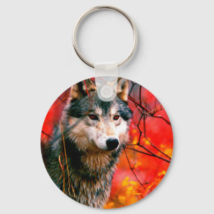 Wolf die door bladeren in het bos loopt sleutelhanger