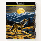 Wolf huilt bij de lichtgevende maan op een schetsb notitieboek (Achterkant)