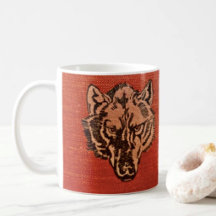 Wolfskop op rode mok