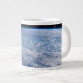 Wolk-bedekte Tasman en koraal Zeeen. Grote Koffiekop (Voorkant rechts)