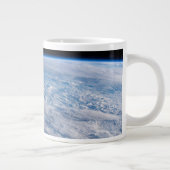 Wolk-bedekte Tasman en koraal Zeeen. Grote Koffiekop (Rechts)