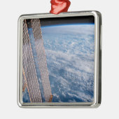 Wolk-bedekte Tasman en koraal Zeeen. Metalen Ornament (Links)