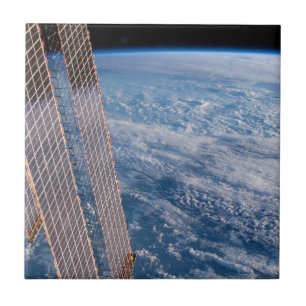 Wolk-bedekte Tasman en koraal Zeeen. Tegeltje