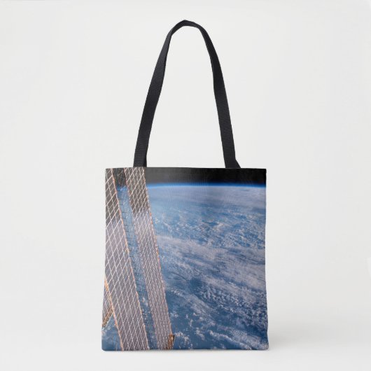 Wolk-bedekte Tasman en koraal Zeeen. Tote Bag (Voorkant)