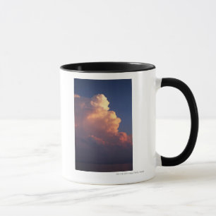 Wolken boven zee bij zonsondergang mok