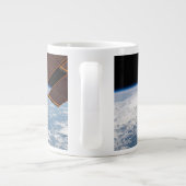 Wolkenformaties rond zonneschijn voor de Stille Oc Grote Koffiekop (Achterkant)