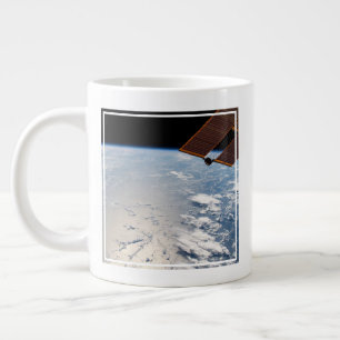 Wolkenformaties rond zonneschijn voor de Stille Oc Grote Koffiekop
