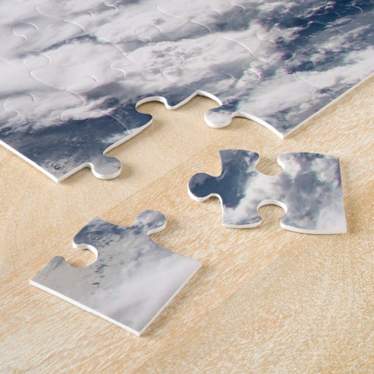 Wolkenformaties rond zonneschijn voor de Stille Oc Legpuzzel (Zijkant)