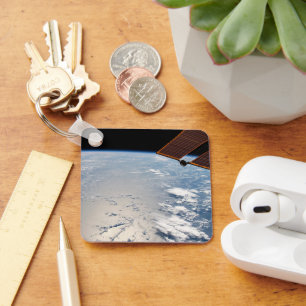 Wolkenformaties rond zonneschijn voor de Stille Oc Sleutelhanger