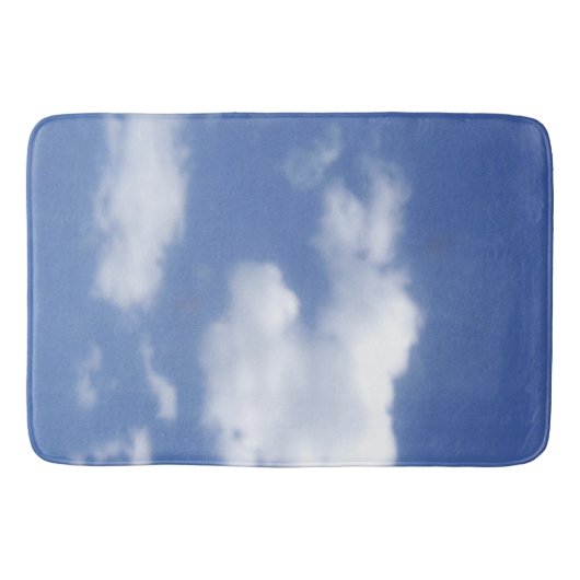 wolkken in blauwe lucht badmat (Voorkant)