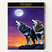 Wolven serenderen de gloeiende maan in de schemeri notitieboek (Achterkant)