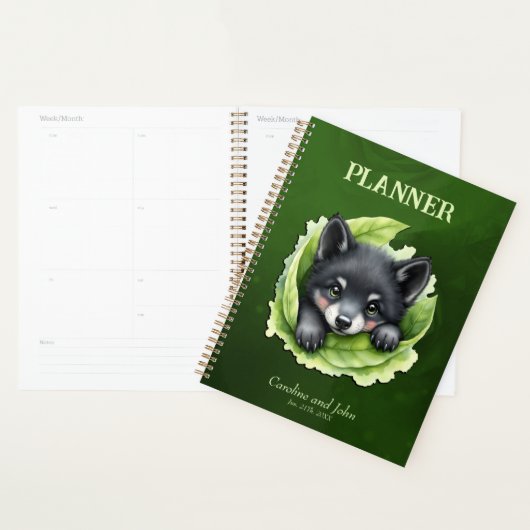 Wolvenwelp in het groen planner (Display)