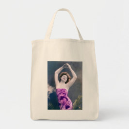 woman in purple sarong , arms raised as if dancing tote bag