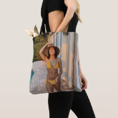 Woman in yellow bikini standing on brown brick flo tote bag (Dichtbij)