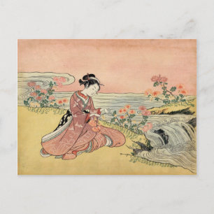 Woman picking chrysanthemums briefkaart