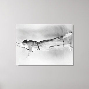 Woman Swinging Tennis Raquet Canvas Afdruk