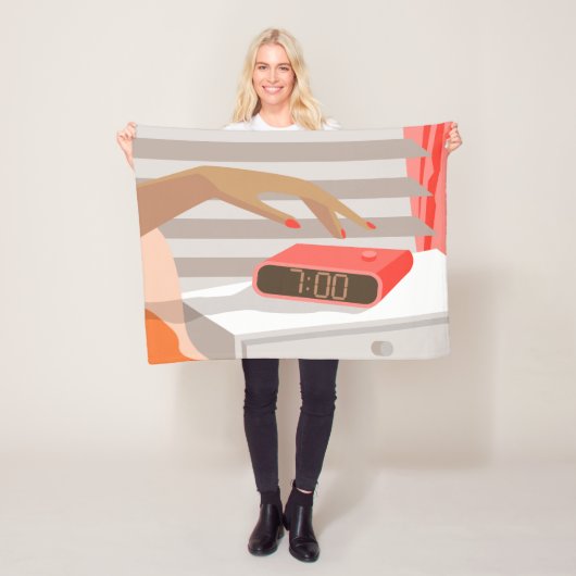 Womans hand pushing on alarm clock snooze button fleece deken (In situ)