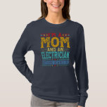 Womens Distressed I'm A Mom And An Electrician T-shirt<br><div class="desc">Womens Distressed I'm A Mom And An Electrician Funny Mother's Day Gift. Perfect gift for your dad,  mom,  papa,  men,  women,  friend and Famy members on Thanksgiving Day,  Christmas Day,  Mothers Day,  Fathers Day,  4th of July,  1776 Independent day,  Veterans Day,  Halloween Day,  Patrick's Day</div>