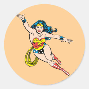 Wonder-vrouw die vooraan vliegt ronde sticker