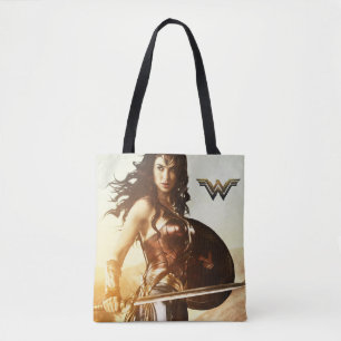 Wondervrouw op zonsondergang tote bag