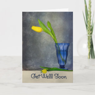 Word goed spoedig gele tulp in blauw glas kaart
