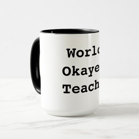 Worlds Okayest Teacher Mok (Voorkant links)