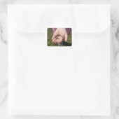 Wormen in kinderhanden ronde sticker (Tas)