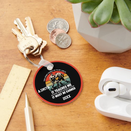 Worstelen moet je verdienen sleutelhanger (Bureau)