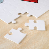 Wortel als skier met skiën legpuzzel (Zijkant)