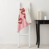 Wreaten van rode rozen roze bladeren roze sherpa deken (In situ)