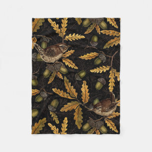 Wrens en eikels op zwart fleece deken