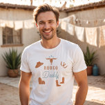 WYNONA Sinaasappel & Blauwgroen Cowgirl Rodeo Dadd T-shirt<br><div class="desc">Dit t-shirt heeft leuke oranje en blauwgroen cowgirl graphics en de woorden 'rodeo daddy' in een zoete rodeo lettertypecombinatie. Dit papa shirt is het perfecte cadeau voor je favoriete papa,  een eerste verjaardagsfeestje shirt,  of werkt als een geweldig zwangerschapsaankondigingsidee.</div>