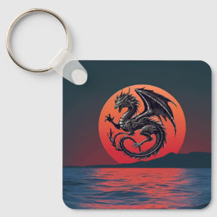 Wyvern stijgt op over zonsondergang oceaan sleutelhanger