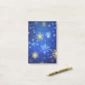 XMAS Blauwe Achtergrond met Golden Snowflakes Post-it® Notes (Op bureau)