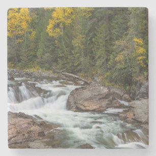 Yaak-waterval in de herfst in het Kootenai Nationa Stenen Onderzetter