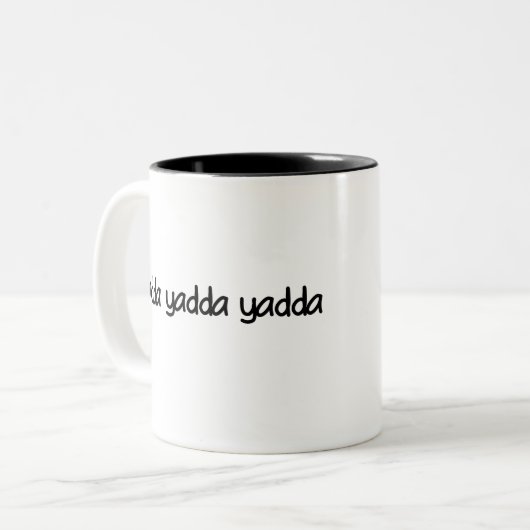 Yadda yadda yadda tweekleurige koffiemok (Voorkant links)