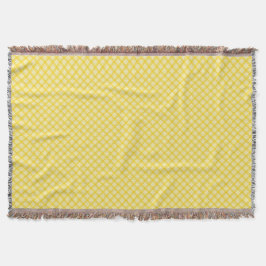 Yellow and gray patterned blanket with fringed deken