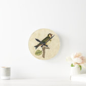 Yellow and Green Bird Perched on a Little Branch Ronde Klok (Huis)