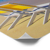 Yellow beach umbrella and chairs on prisping poster (Hoek)