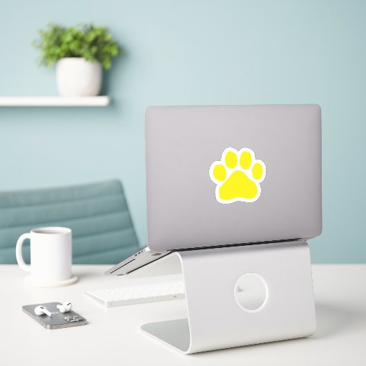 Yellow Paw Print Sticker (Laptop op bureau)