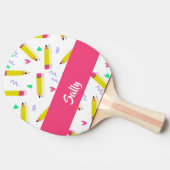 Yellow pencils and scrabbles on white tafeltennisbatje (Zijkant)