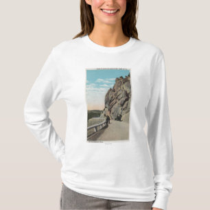 Yellowstone, WYVacationers, oude auto, nabij T-shirt