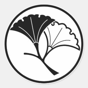 Yin en yang ginkgo bladeren in draadvormige ring ronde sticker
