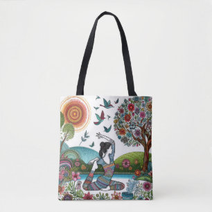 Yoga beoefening in de gloed van zonlicht en bloese tote bag