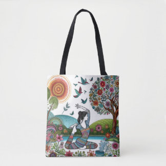Yoga beoefening in de gloed van zonlicht en bloese tote bag