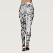 Yoga-oefening met zwarte en witte bladluis leggings (Achterkant)