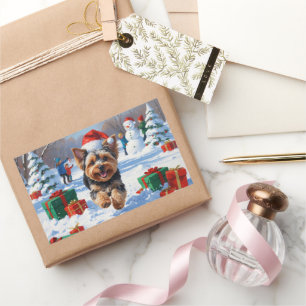 Yorkipoo die in de sneeuw rent met Kerstmuts Rechthoekige Sticker
