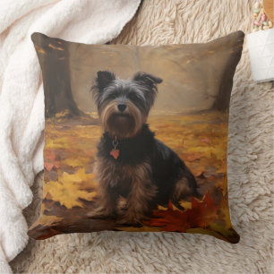 Yorkipoo in herfstbladeren vallen inspireren kussen