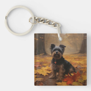 Yorkipoo in herfstbladeren vallen inspireren sleutelhanger